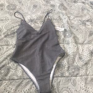 Black and white checkered one piece bathing suit